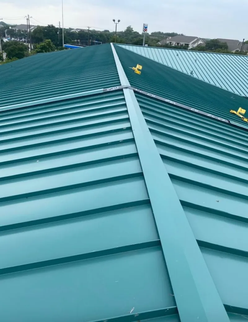 Green commercial metal roof ridge and valley for Metal Roof Repair in Eastham